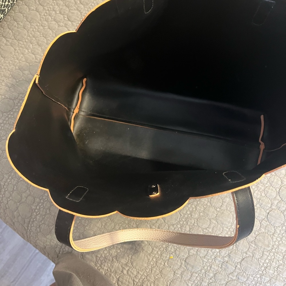 Can't remember  the brand but it's a very pretty tote
